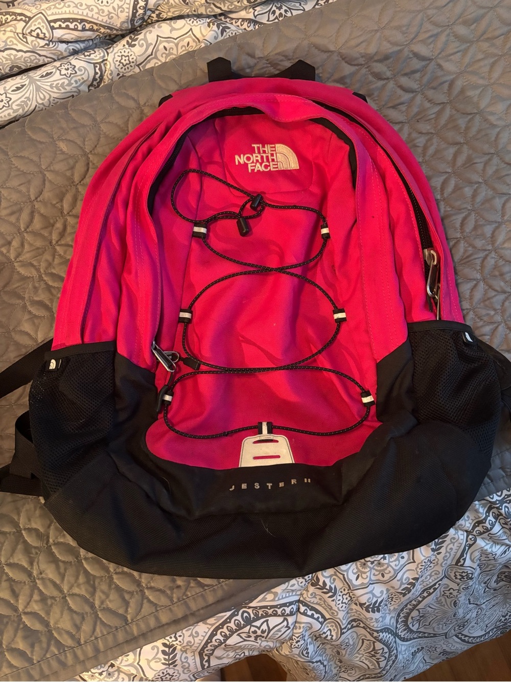 The North Face Pink and Black Jester Backpack with Bungee Front